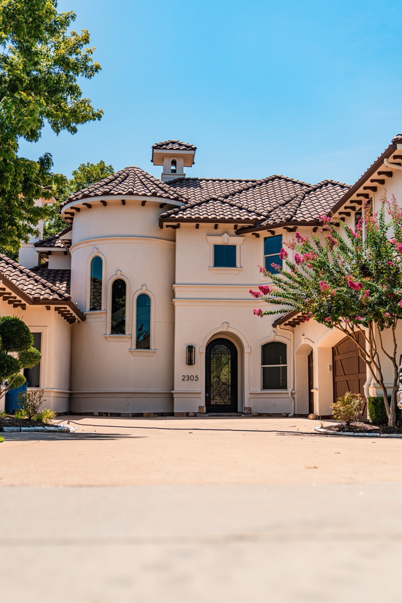 The finished home under a clear Texas sky.